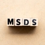 Letter block in word MSDS (Abbreviation of material safety data sheet) on wood background